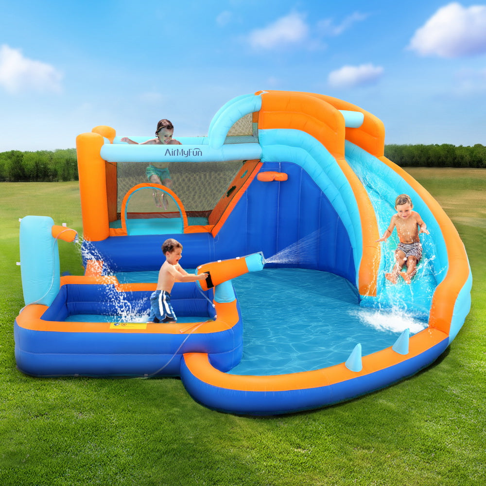 inflatable water park with slide, pool, and bounce castle for outdoor summer fun and entertainment.