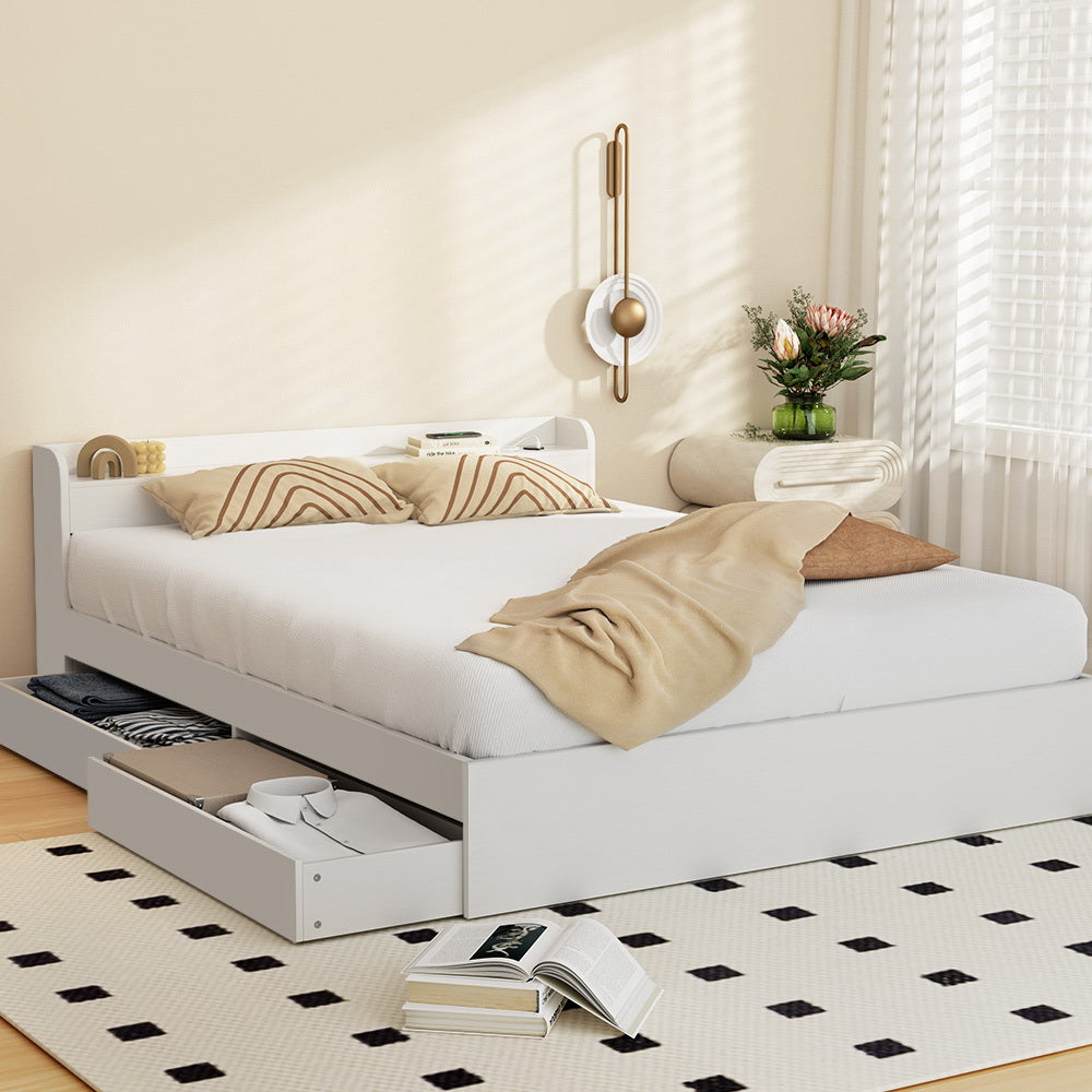 Double bed frame with storage drawers and charging ports for kids room organization.