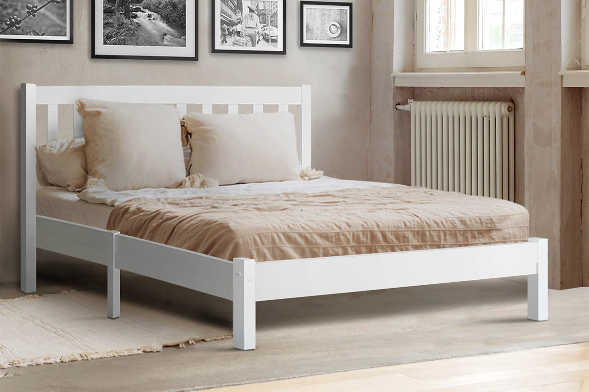 White wooden kids bed frame with whimsical design, ideal for the childs bedroom decor.