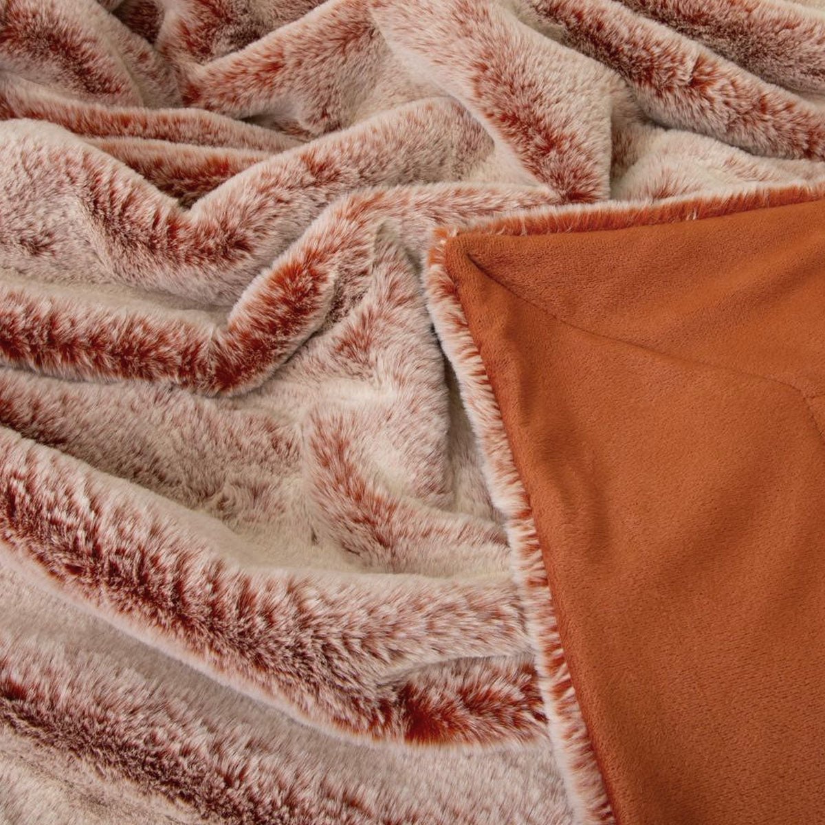 Soft and stylish kids faux fur throw blanket for cozy nights, by J Elliot Home.