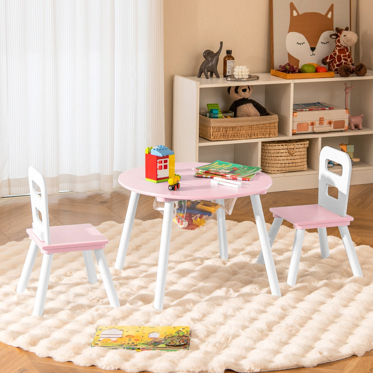 Kids pink activity table set with mesh storage, perfect for play and organization.