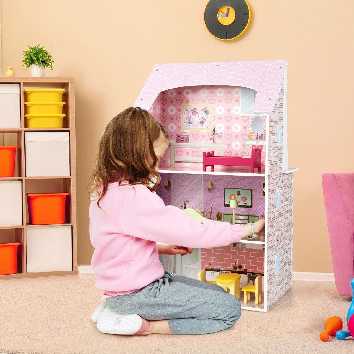 Child Playing with Dollhouse