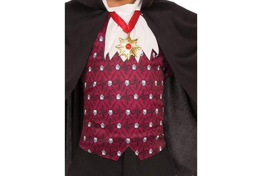 Kids vampire costume with cape and medallion for playful Halloween dress-up at home.