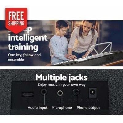 Silver 61-key piano keyboard for children, ideal for musical learning at home. Silver 61-key piano keyboard for children, ideal for musical learning at home.