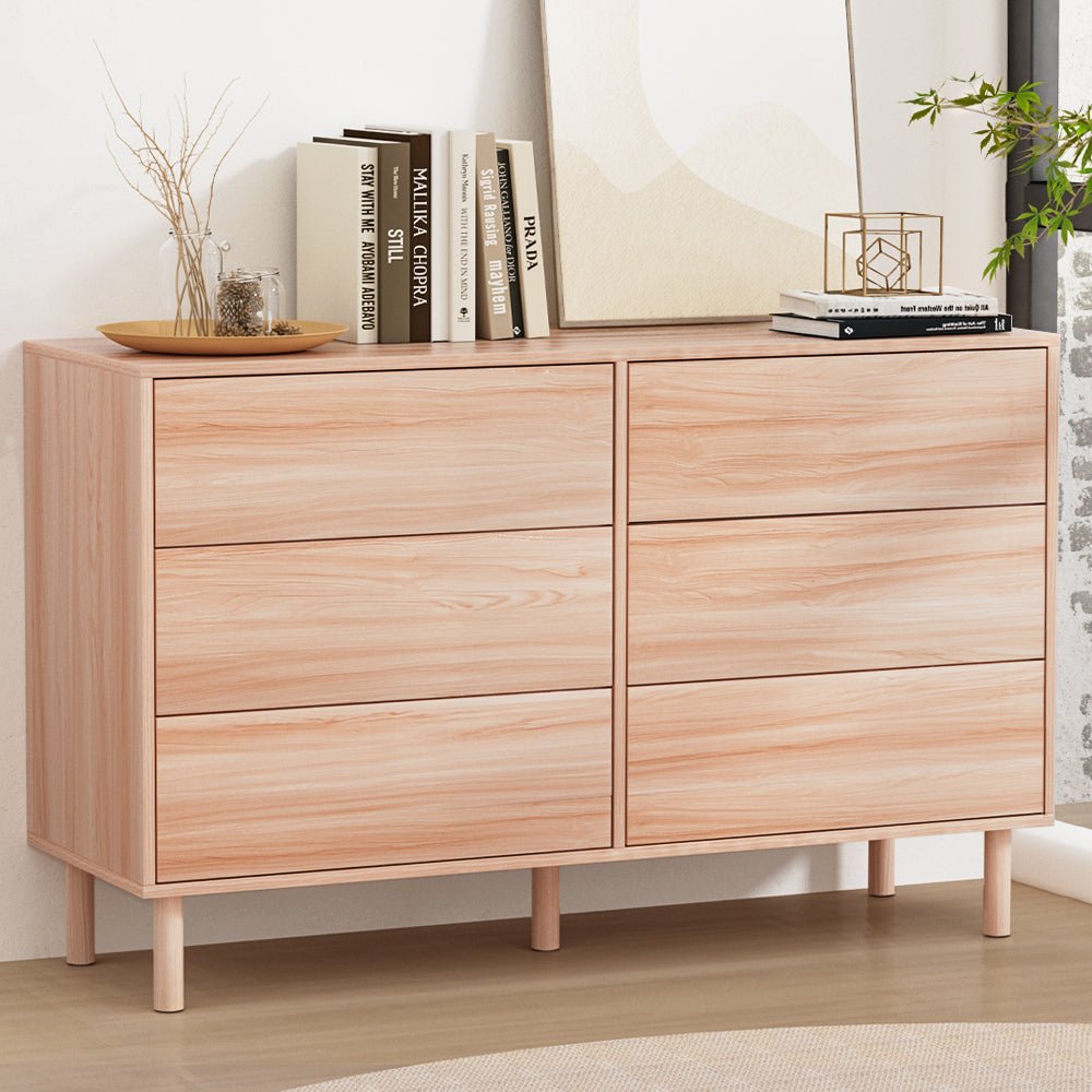 6-drawer tallboy storage cabinet in pine finish, ideal for childrens room organization.