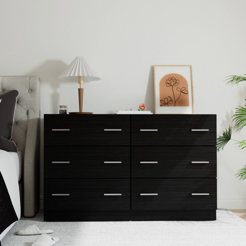 Modern lowboy dresser table with 6 drawers in black, ideal for childrens bedroom storage. Modern lowboy dresser table with 6 drawers in black, ideal for childrens bedroom storage.