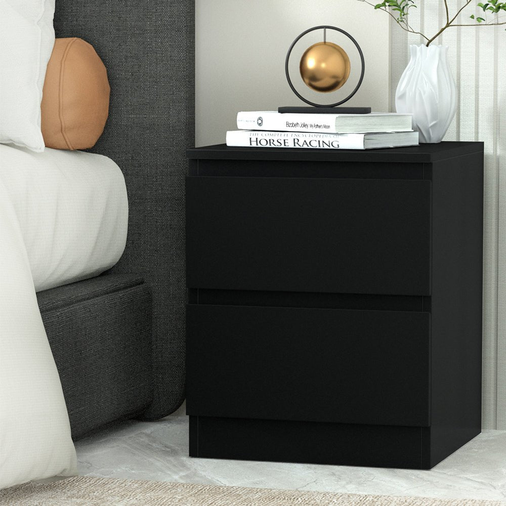 Kids black bedside table with drawers from Artiss for stylish and practical bedroom organization.