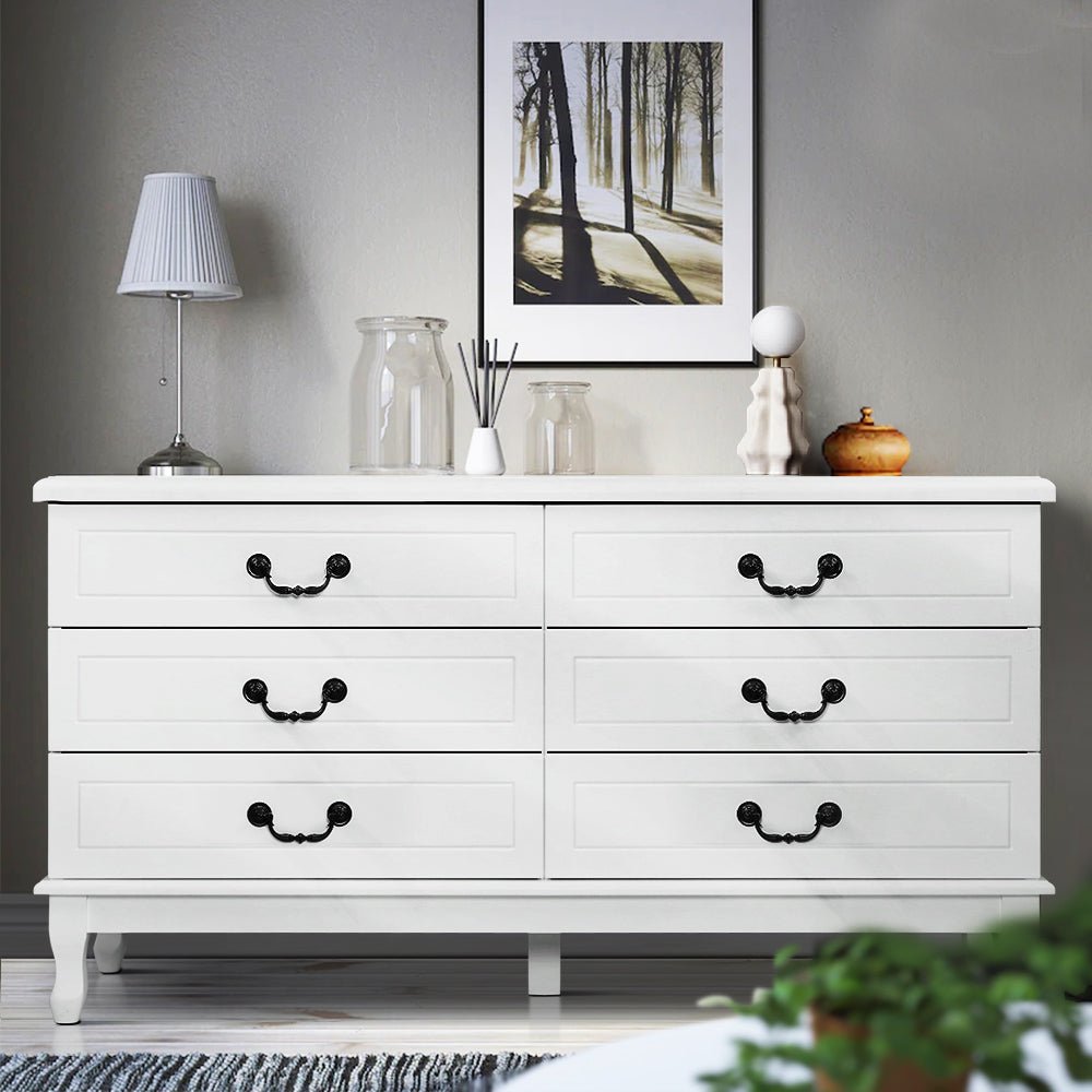 White KUBI lowboy dresser with ample storage for childrens bedroom organization.