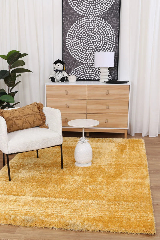 Bright yellow shaggy rug ideal for childrens rooms, bringing cozy comfort and playful vibes.