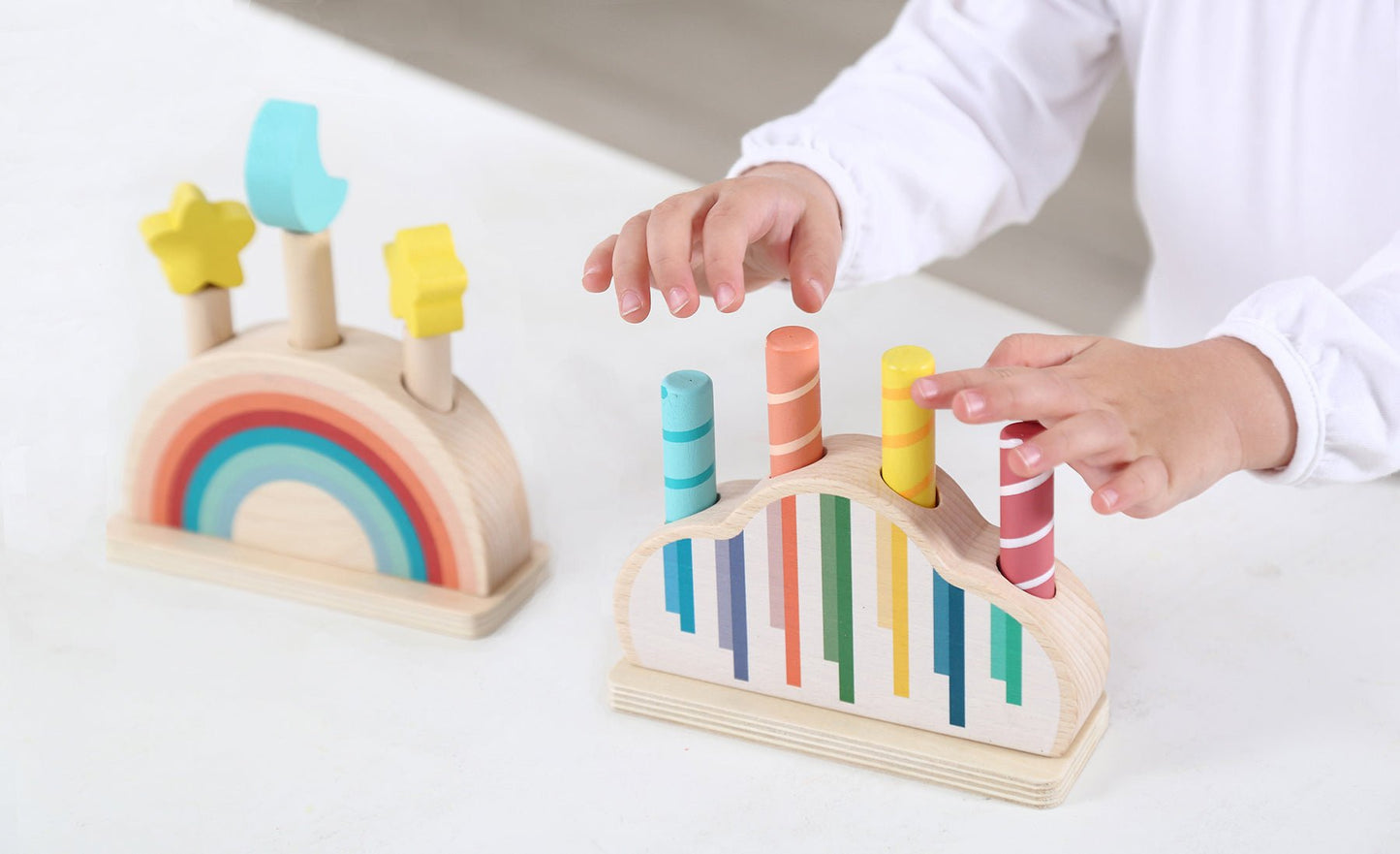 Colorful, interactive pop-up toy rainbow for fun and sensory play at home.
