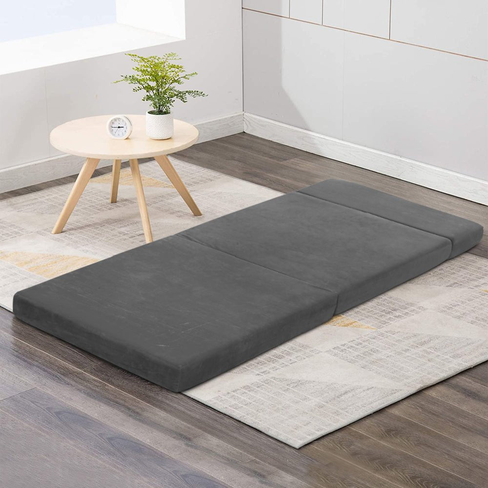 Foldable grey foam mattress for kids sleepovers - portable and versatile home-bed solution. Foldable grey foam mattress for kids sleepovers - portable and versatile home-bed solution.