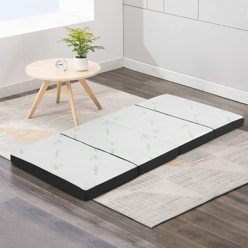 Portable tri-fold foam mattress for kids, space-saving and versatile for home use. Portable tri-fold foam mattress for kids, space-saving and versatile for home use.