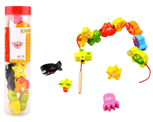 Marine-themed lacing blocks for creative play, ideal for childrens motor skill development at home.