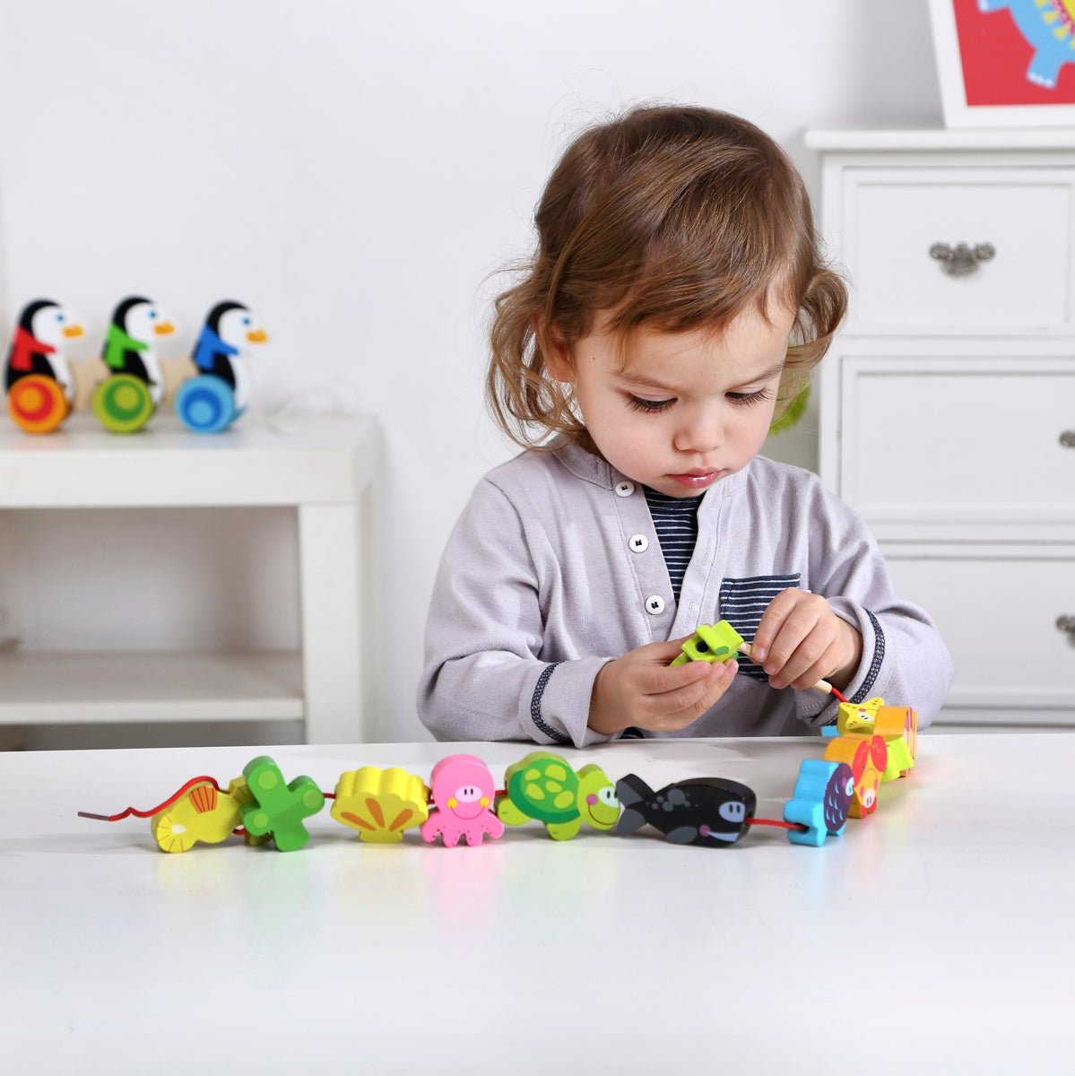 Colorful marine-themed lacing blocks for fine motor skill development, ideal for childrens play. Colorful marine-themed lacing blocks for fine motor skill development, ideal for childrens play.