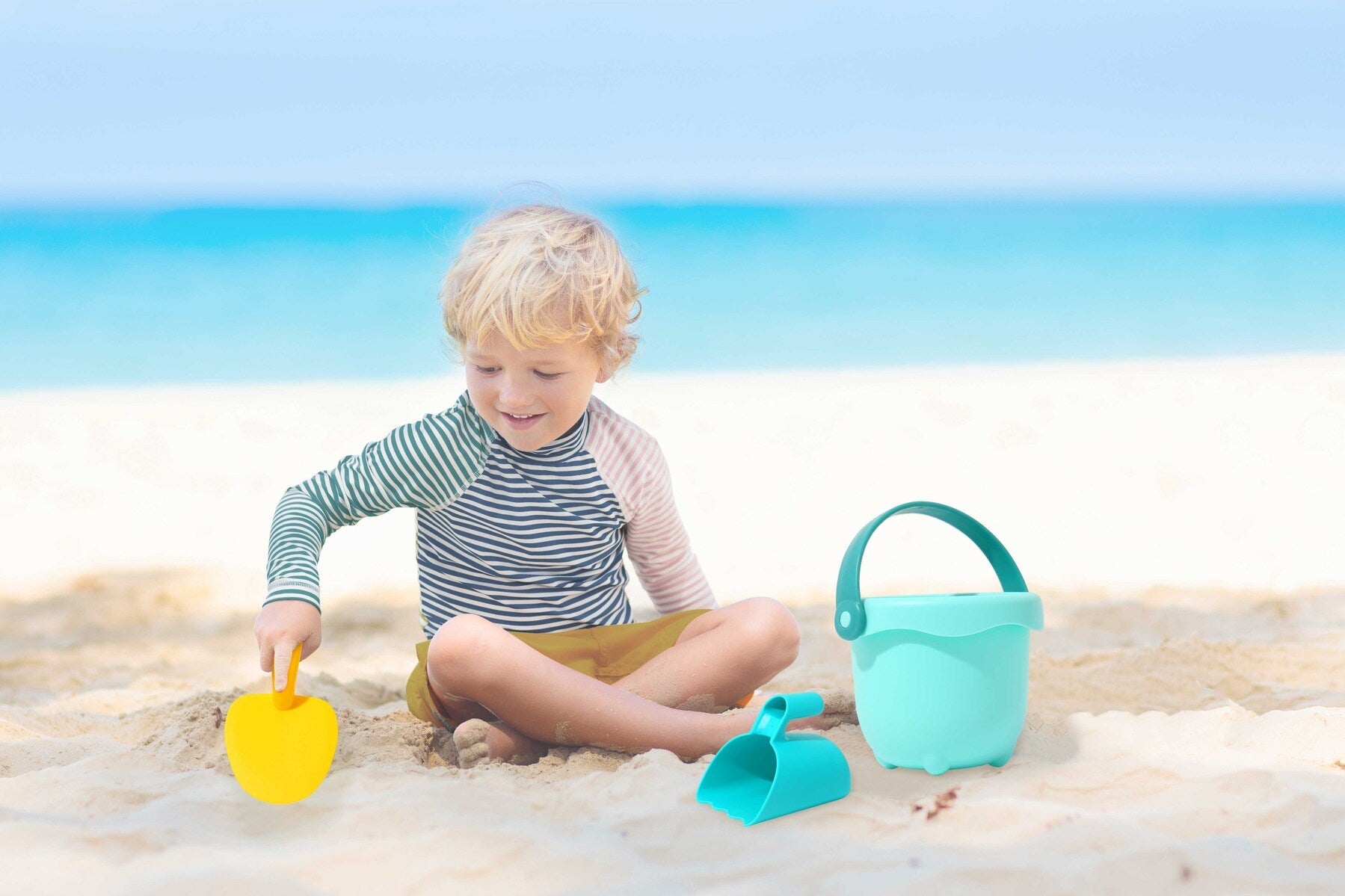 Kid Enjoying Tookyland's Beach Toy Set