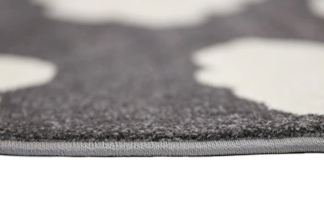 Petit Clouds Dark Grey and White Kid Rug perfect for cozy, playful childrens bedroom decor. Petit Clouds Dark Grey and White Kid Rug perfect for cozy, playful childrens bedroom decor.