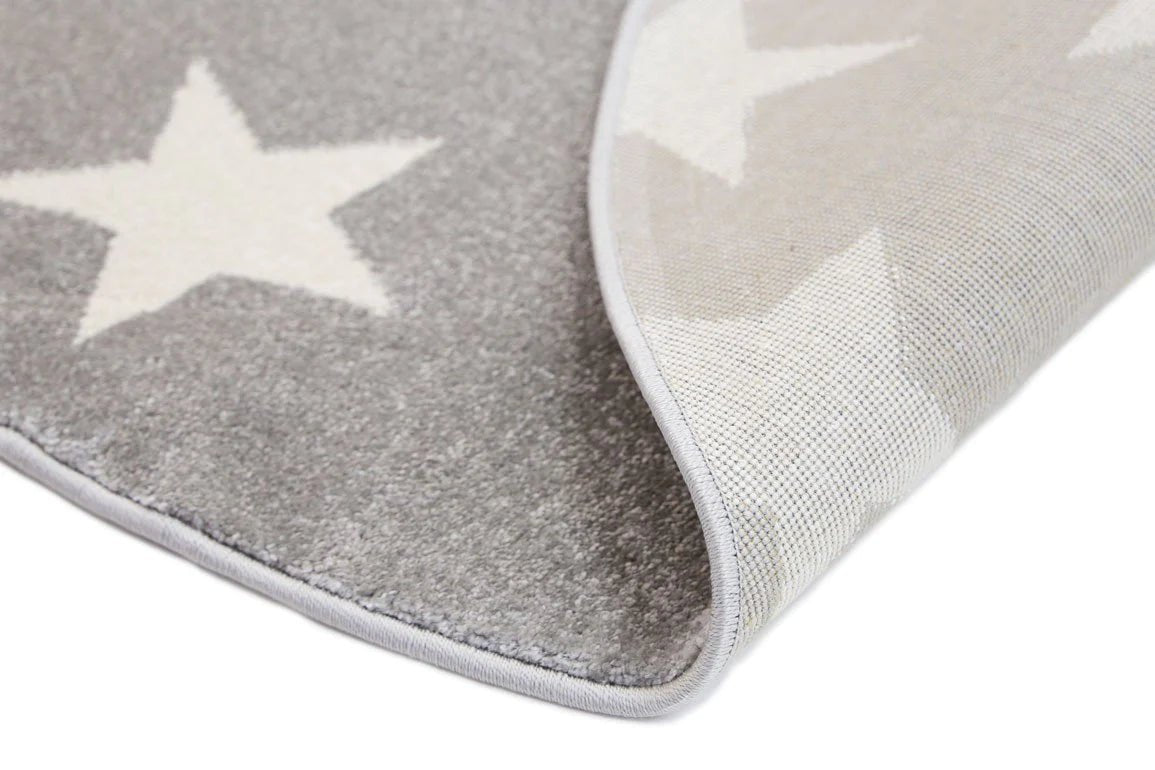 Petit Stars Kids Rug in Light Grey and White, charming addition to childrens bedroom decor.