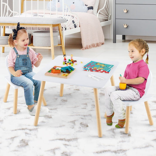 Pink and white bunny-eared kids table and chair set for playful home activities.