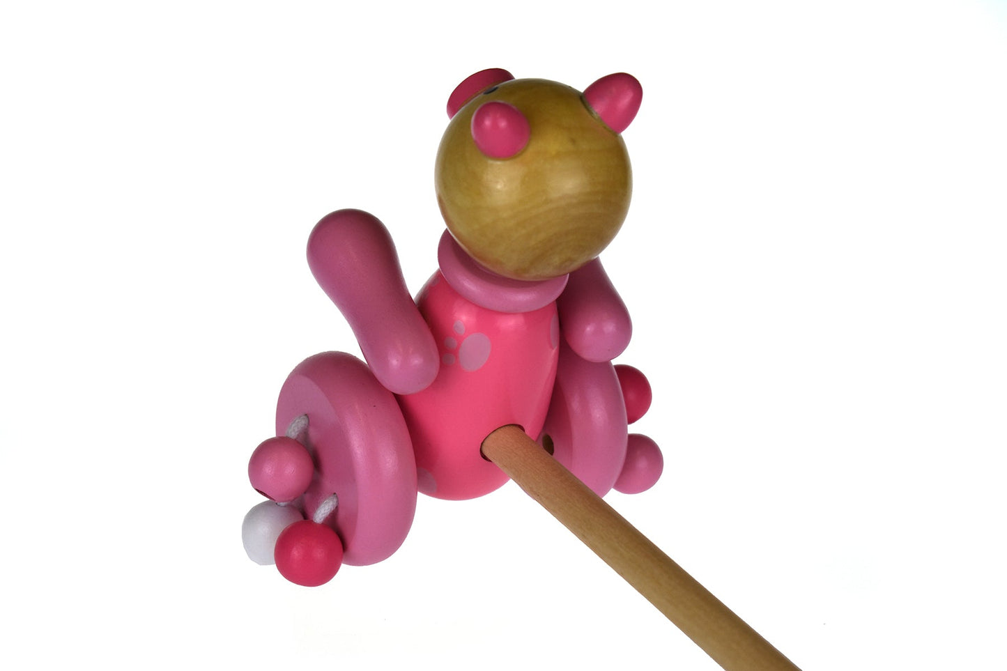 Wooden push along pig toy for interactive play and motor skill development in kids. Wooden push along pig toy for interactive play and motor skill development in kids.