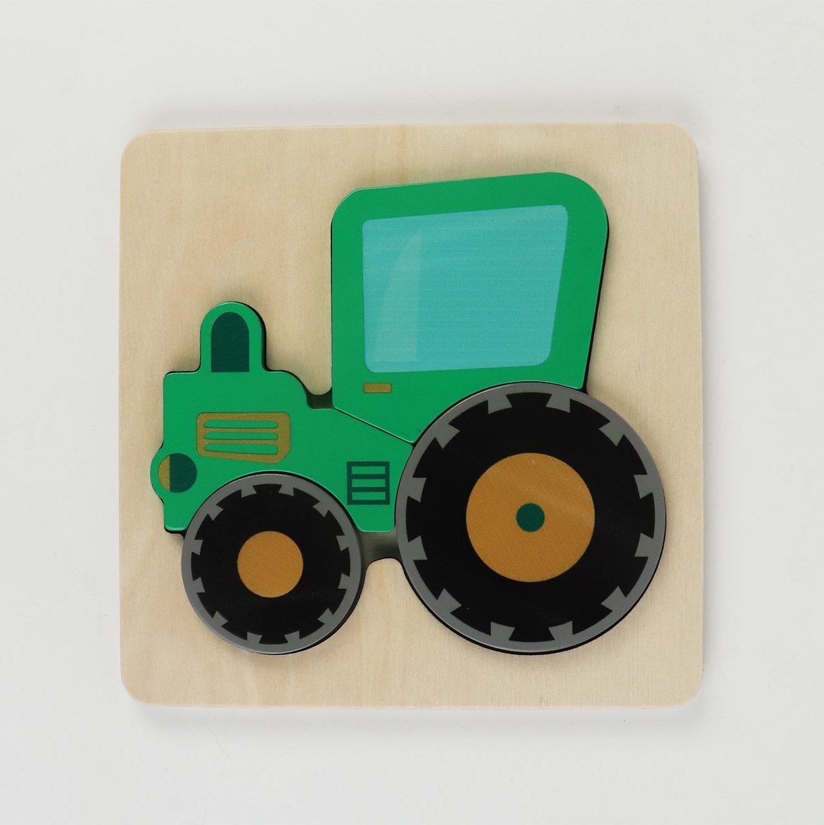 Colorful tractor chunky puzzle for kids, perfect for developing hand-eye coordination skills at home.