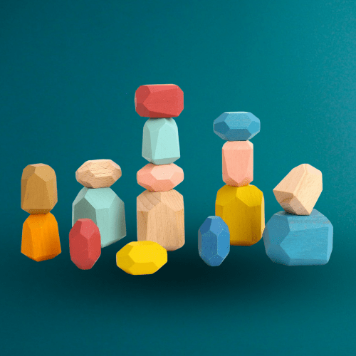 Wooden Stacking Stone Blocks for creative play and motor skill development in kids. Wooden Stacking Stone Blocks for creative play and motor skill development in kids.