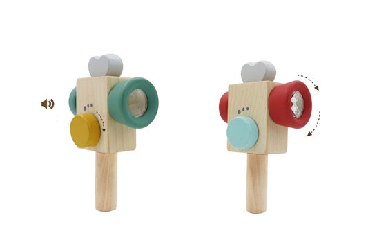 Green wooden toy video recorder for kids, encouraging creativity and imaginative play at home.
