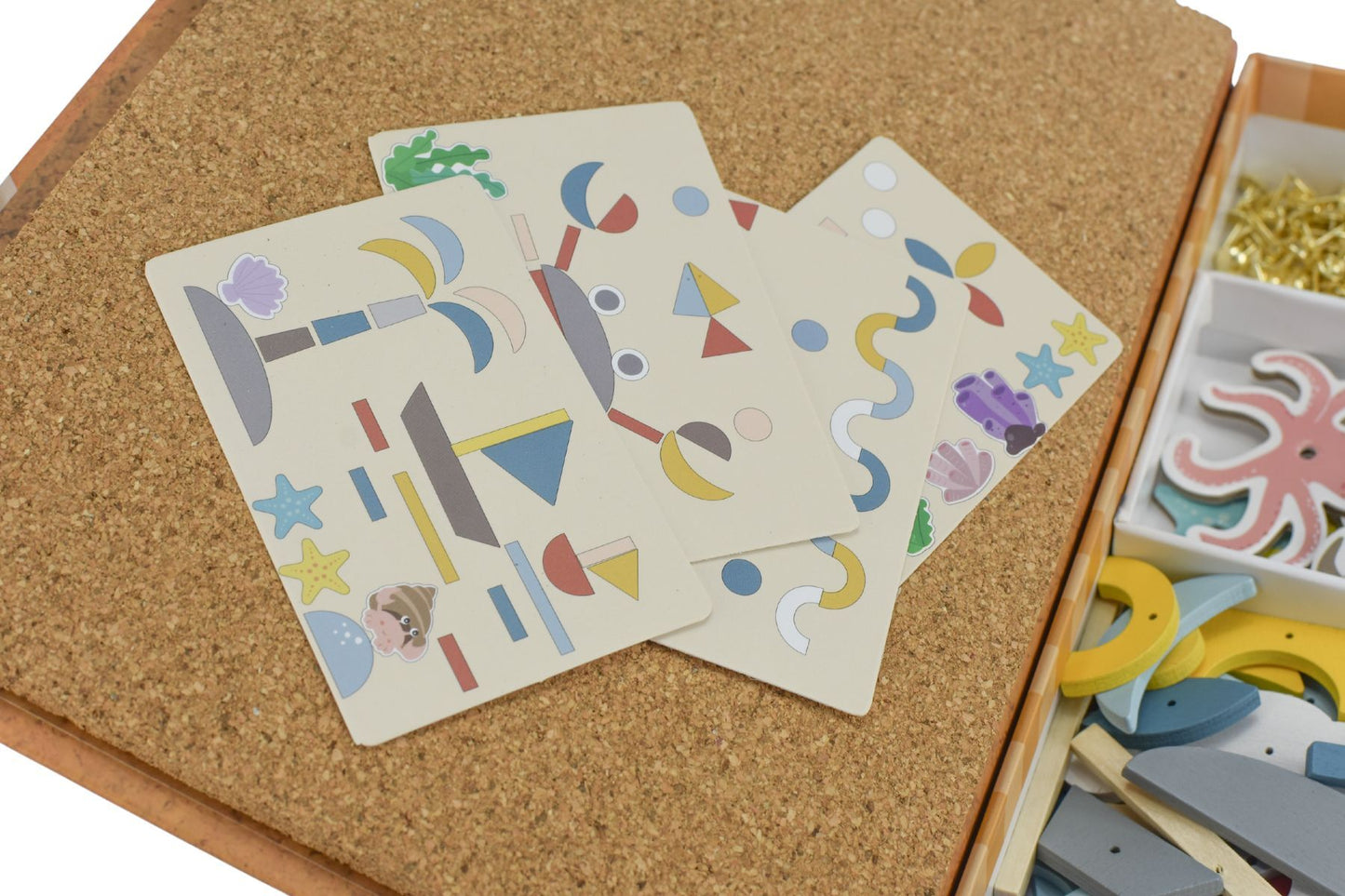 Wooden tap-and-shape bookcase with underwater theme for interactive learning and playtime. Wooden tap-and-shape bookcase with underwater theme for interactive learning and playtime.