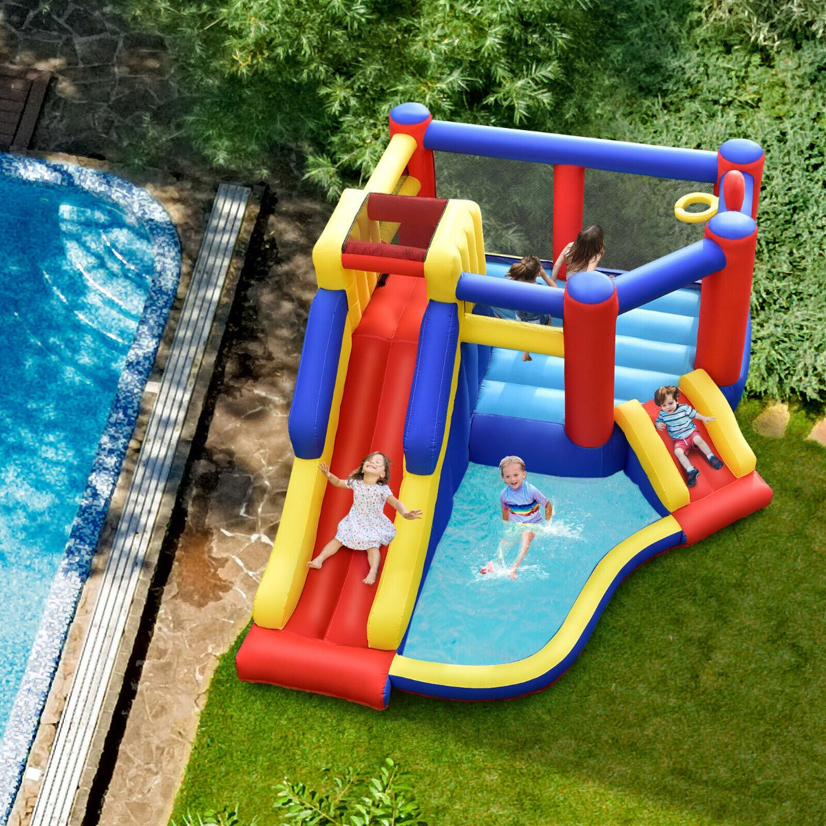 Dual Slide Inflatable Bounce House with Climbing Wall and Blower for thrilling backyard fun.