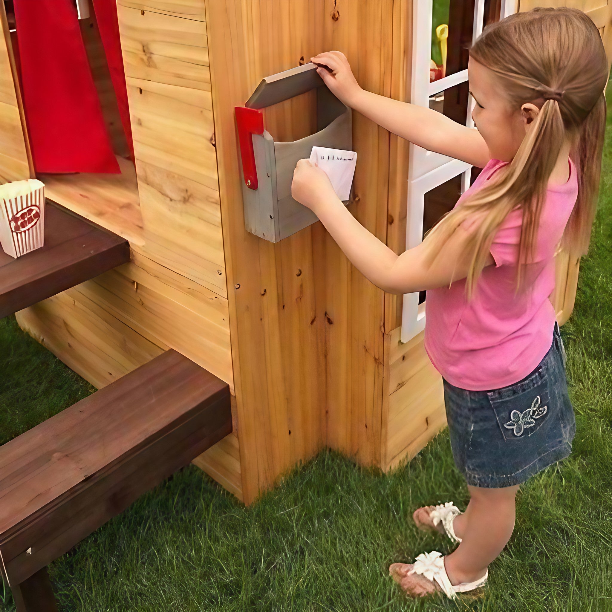 Sending mail in the mailbox on the KidKraft Modern Cubby House