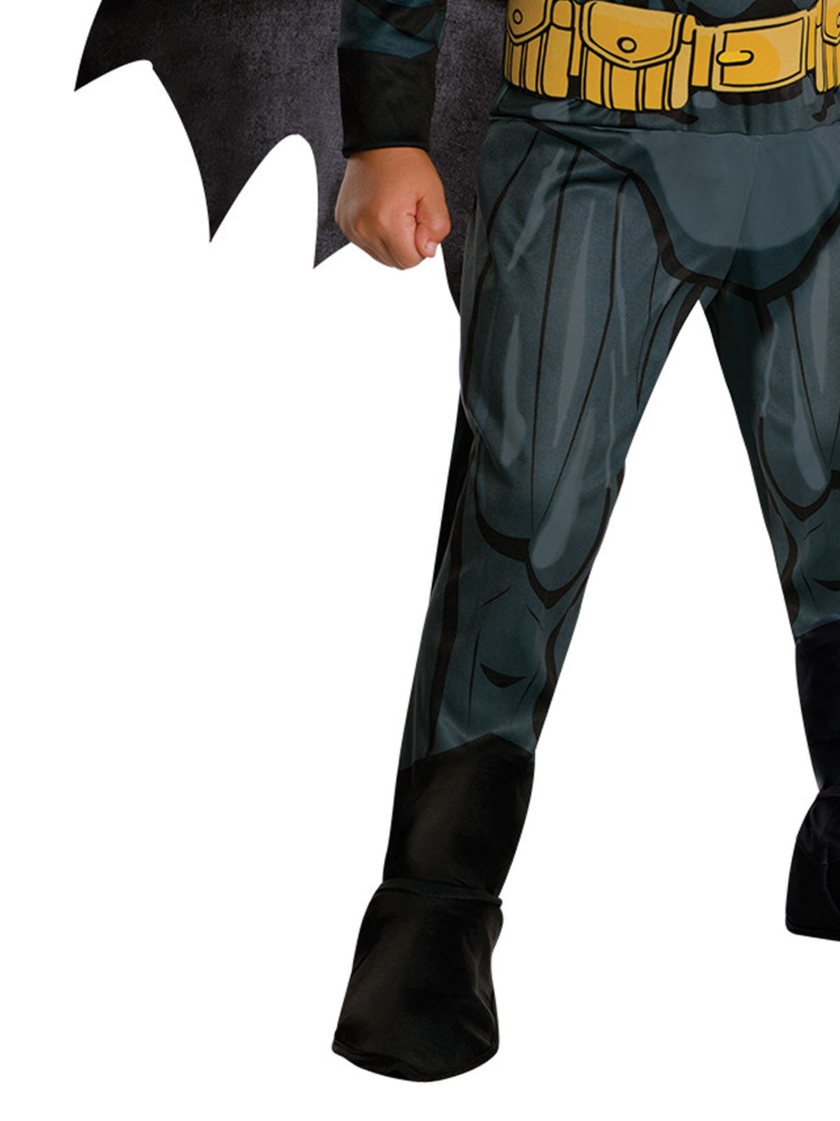 Kids Batman jumpsuit costume with cape and mask for imaginative play at home.