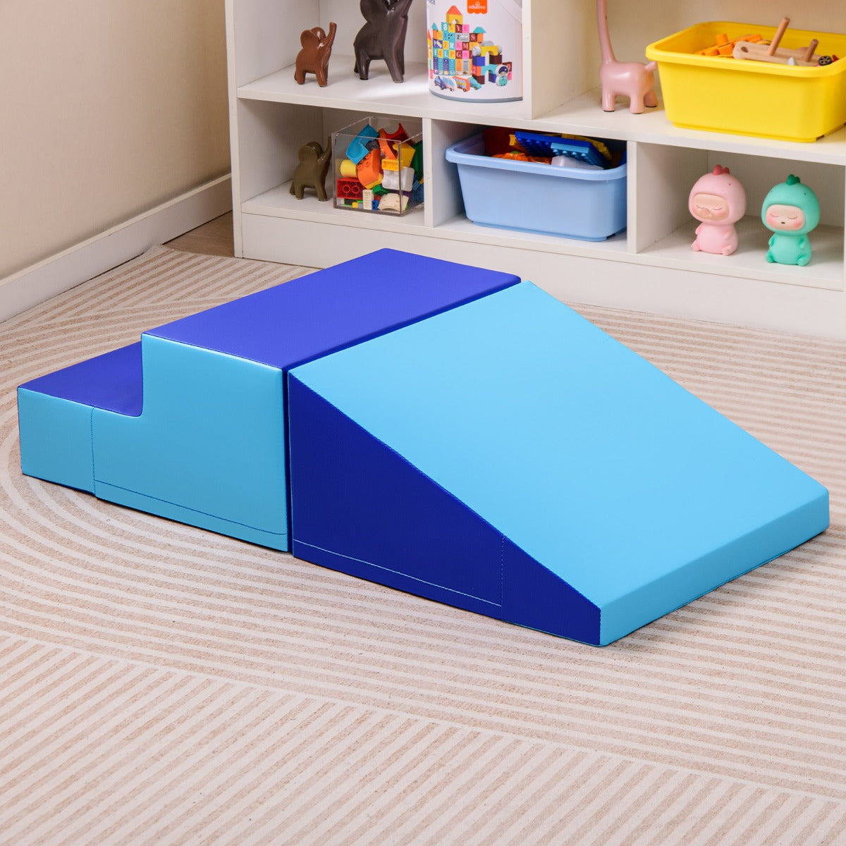 Blue soft foam climbing blocks set for toddlers, ideal for indoor active play at home.