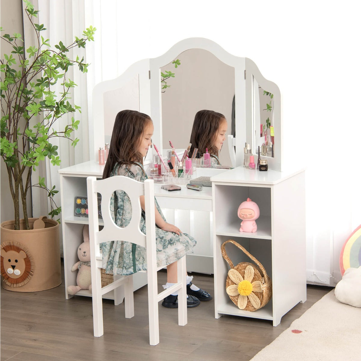 Kids vanity table with mirror and chair for imaginative play and grooming activities.