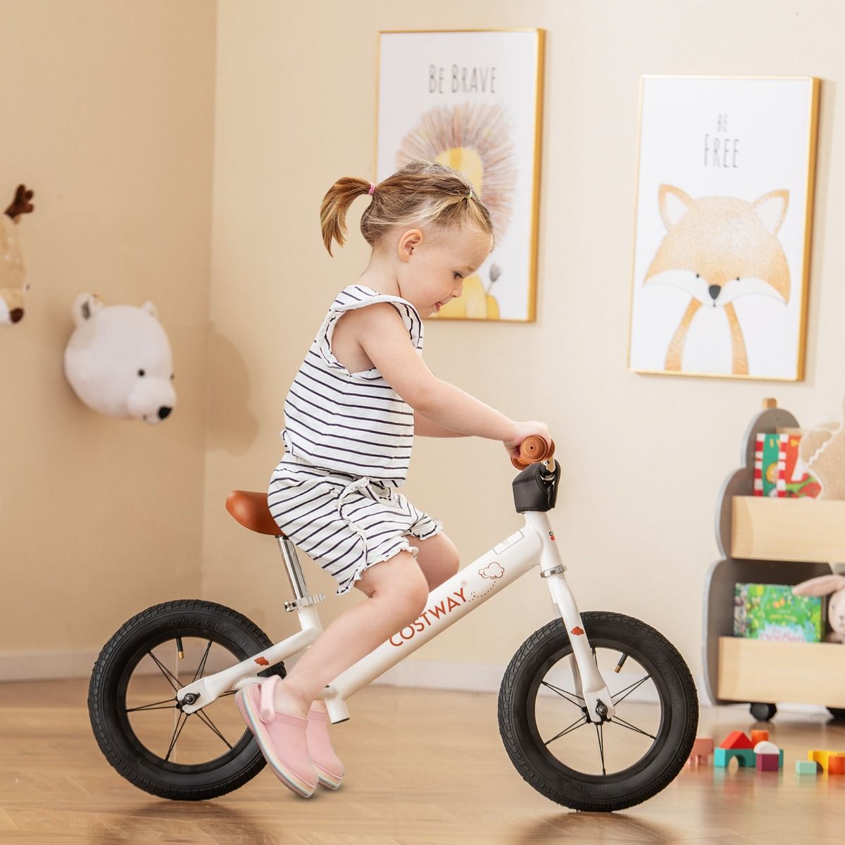 White 30cm toddler balance bike for ages 3+, adjustable design for kids balance training.