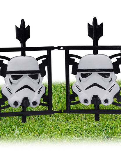 Stormtrooper helmet fence panels for Star Wars-themed parties, perfect for childrens play areas.