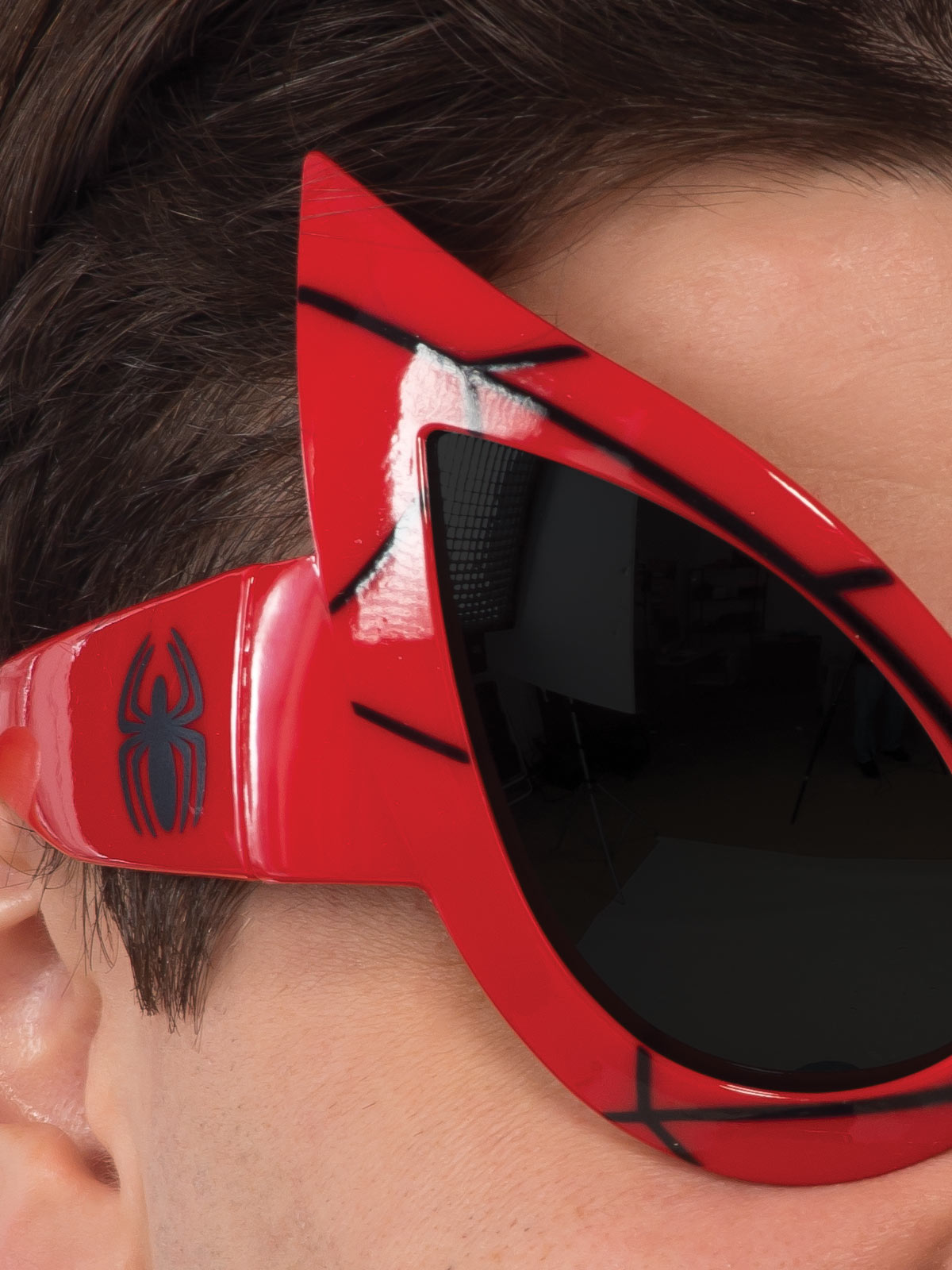 Spider-Man adult goggles with web detail, perfect for kids role-playing at home.