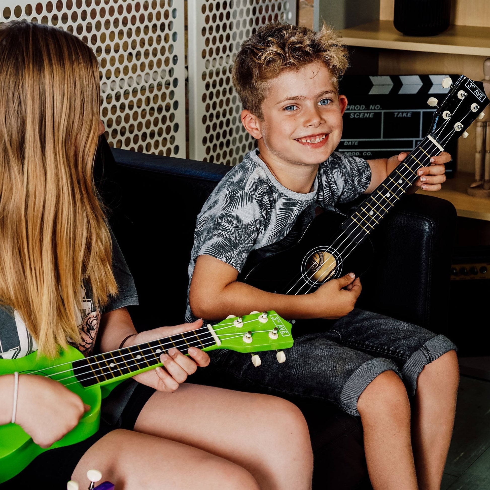 3rd Avenue child-friendly black soprano ukulele perfect for beginner musicians at home.