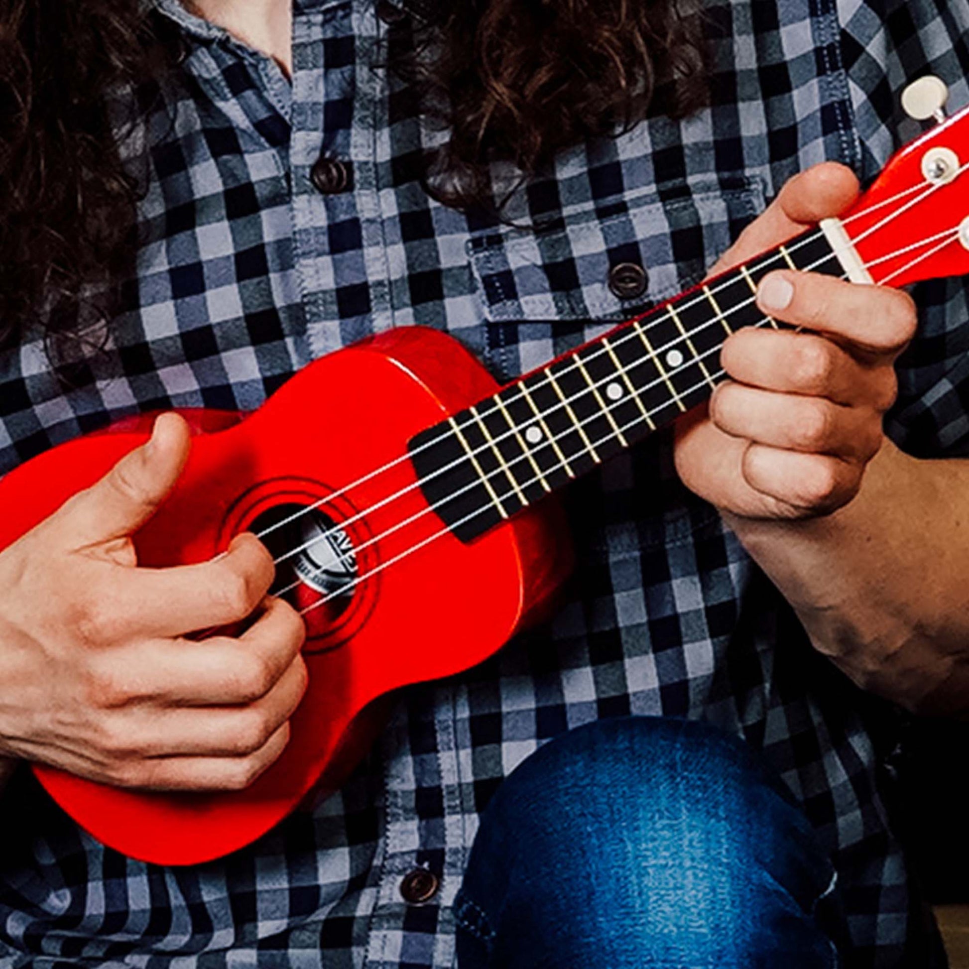 3rd Avenue red soprano ukulele, ideal for kids to learn music at home.