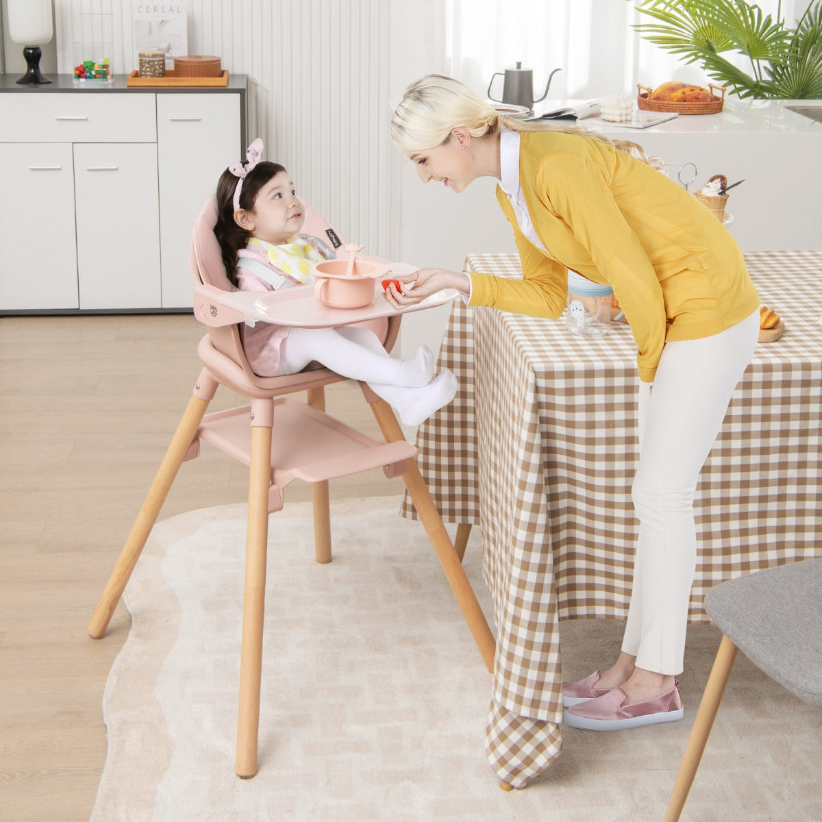 6-in-1 Convertible Wooden Baby High Chair & Toddler Seat in Pink for versatile feeding.