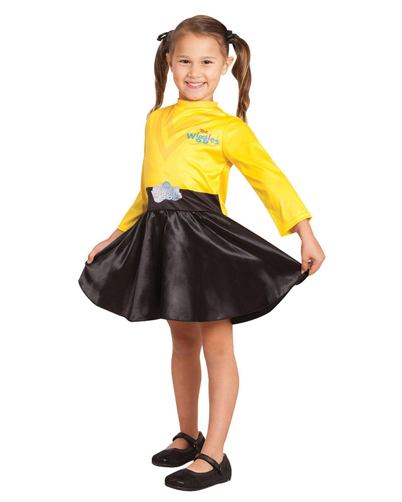 Child wearing a yellow and black costume with The Wiggles logo