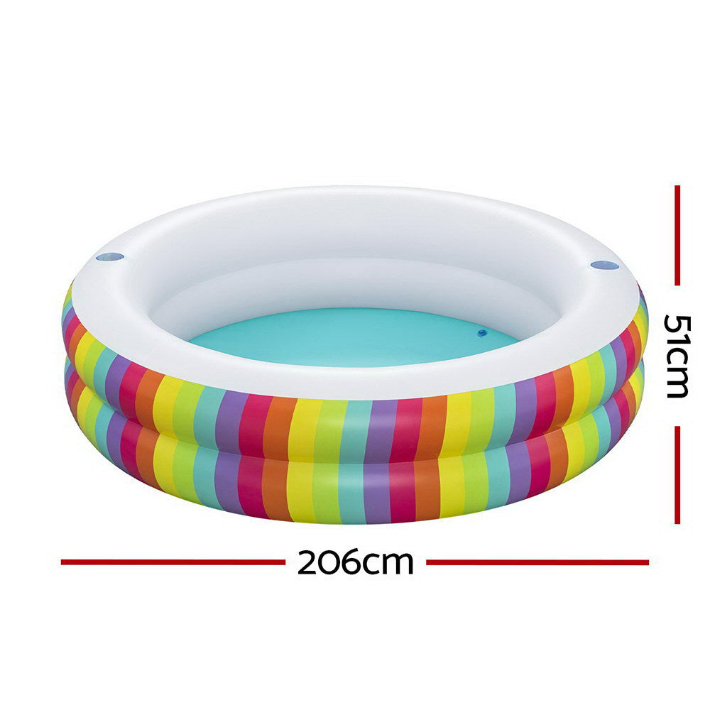 Colorful inflatable kids pool with cup holders for fun summer play in the backyard.