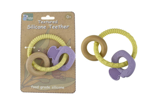 Purple silicone key teether soothes baby gums with safe, koala-inspired design for home relief.