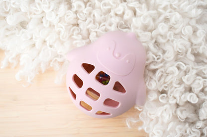 Koala Dream pink silicone penguin rattle for sensory play, perfect for childrens home activities.