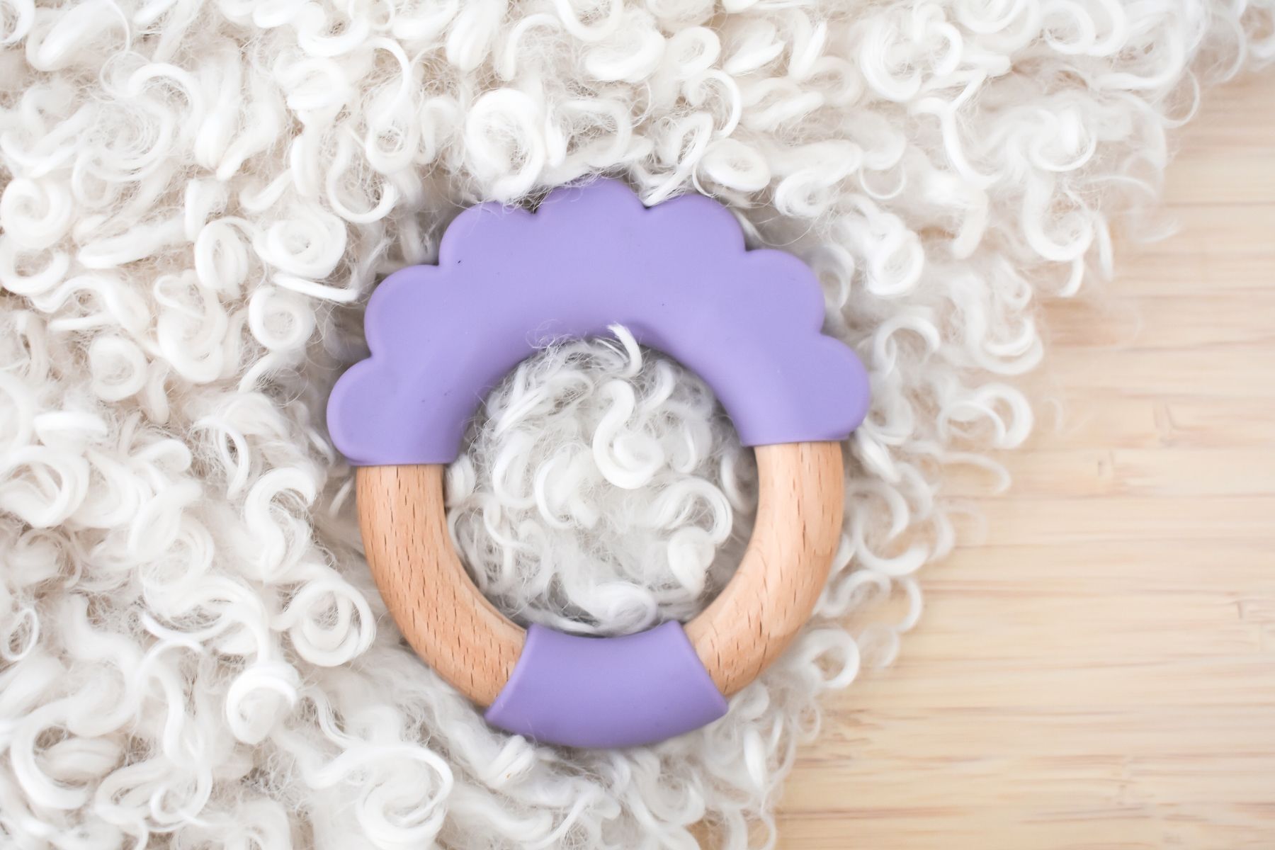 Purple Cloud Silicone Teether with Wooden Ring for soothing gums, by Koala Dream.