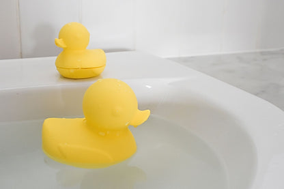 Set of silicone bath ducks with Koala Dream design, safe and easy to clean.