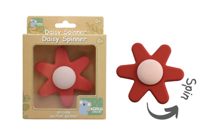 Silicone daisy spinner toy in red and pink for imaginative play at home.