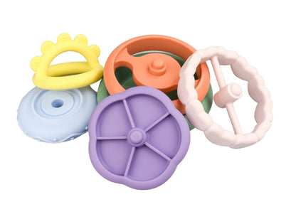 Colorful silicone stacking teether shaped like a koala for soothing babies sore gums.