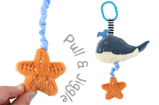 Koala Dream Splashy Whale Jiggler Plush Toy | Interactive pram accessory for kids amusement.