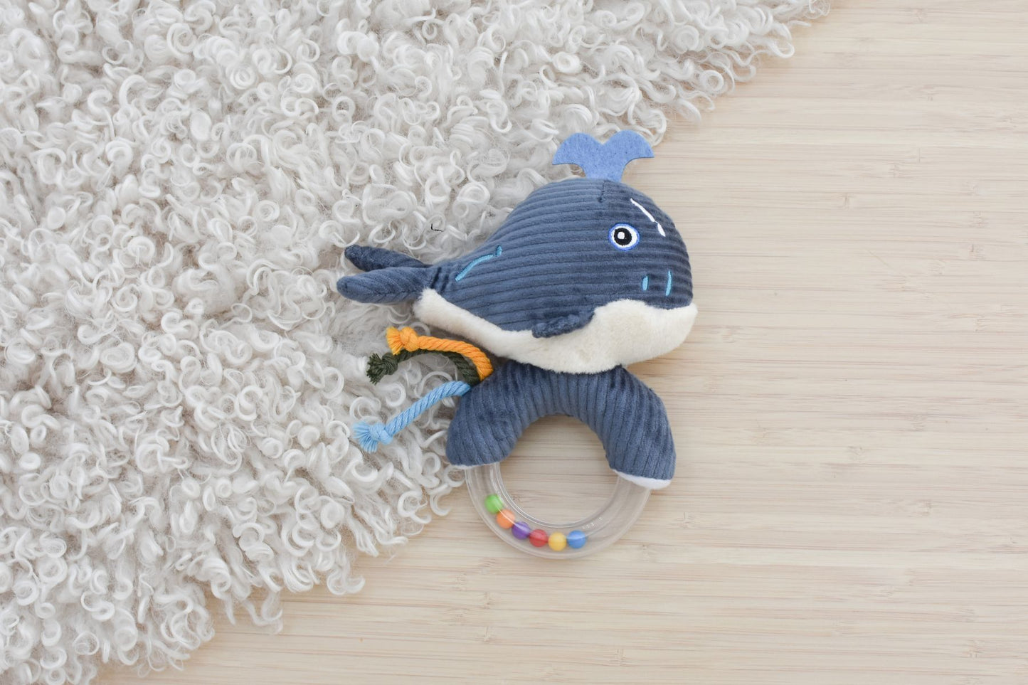 Whale-shaped rattle teether with koala design for soothing babies, perfect for teething relief.