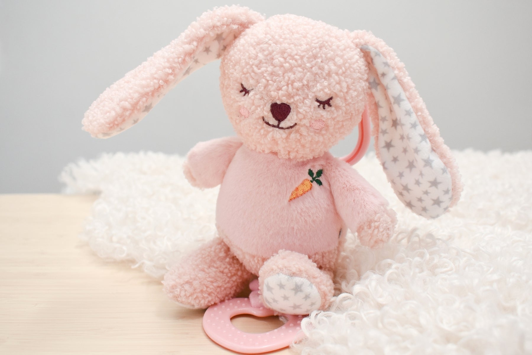 Berry Bunny jiggler teether pram toy, perfect for soothing and entertaining babies on-the-go.