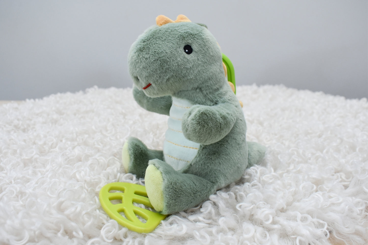 Minty Dinosaur Plush Jiggler with Teether | Soft toy perfect for comforting and soothing kids.